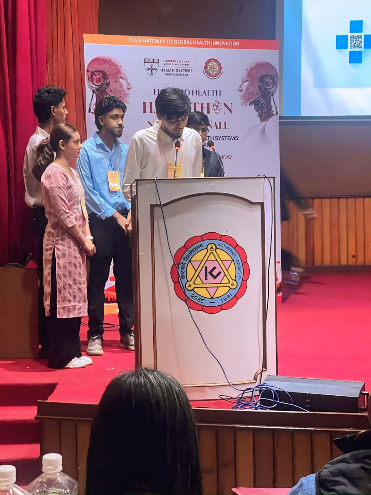 Me pitching at Harvard Hackathon Nepal